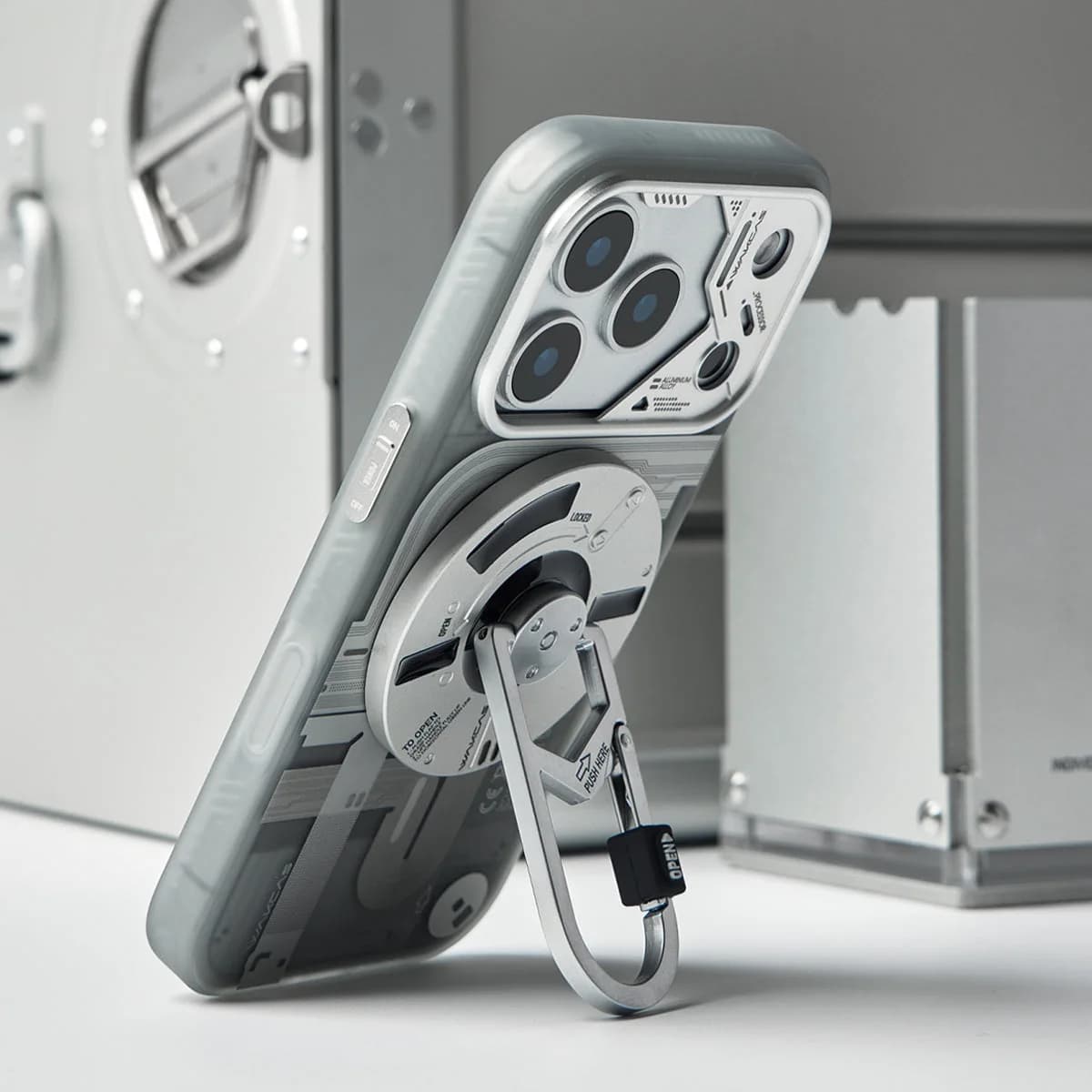 WAKCAS Tech-Core MagSafe iPhone Case | Exposed Mechanical Design with Silver Metal Lens Frame